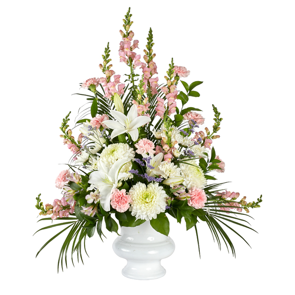 Sweet Dreams Sympathy Tribute holds Pink Snapdragons, Soft Pink Carnations, White Cremones, and Pink Alstroemerias 