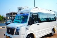 Spacious tempo traveller dashboard and seats