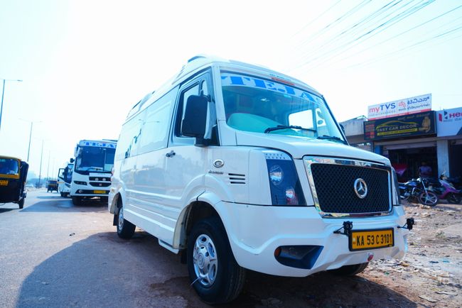 Spacious tempo traveller dashboard and seats