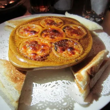 Escargots Baked In Garlic And Cheese