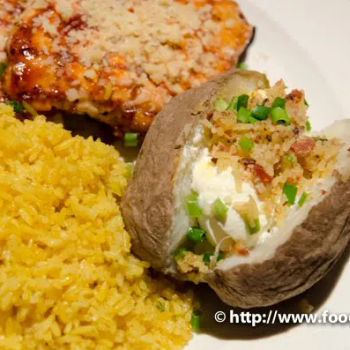 Rice and baked potato on mayo and bacon bits