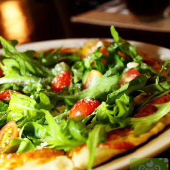 White Pizza with Rucola, Cherry Tomatoes, Egg and Parmigiano