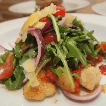 Red Pesto Gnocchi with Tomato and Aragula Salad