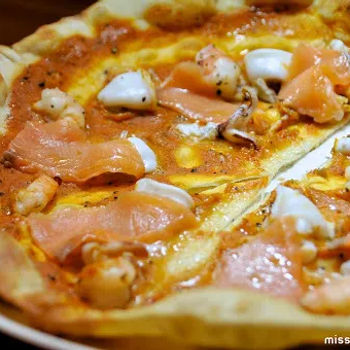 Smoked Salmon, Calamari And Clams Pizza