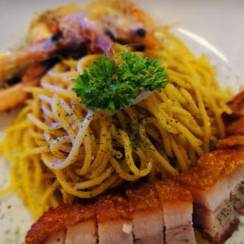 Prawn pasta with crispy roast pork