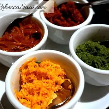 Katta Sambol – Spicy Red Chili; Seeni Sambol – Sweet Onion; Pol Sambol – Coconut; Karupillay Sambol – Curry Leaf Pesto