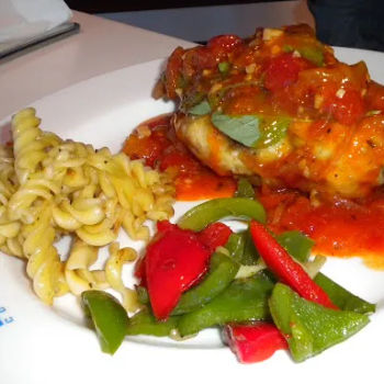 Dory Fish Served With Tomato Sauce