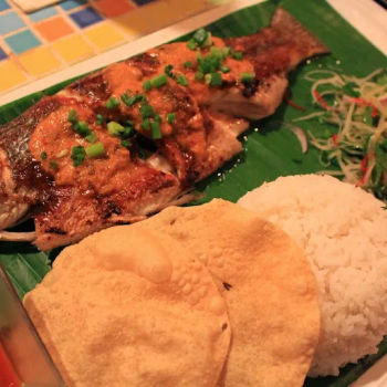  Malay Whole Sea Bass with Turmeric, Chili Paste & Lemongrass with Young Papaya Salad, Steamed Rice with Traditional Sambal