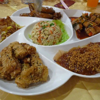 Six Treasures of Shark's fin scrambled egg, cuttle fish with rojak like sauce, bacon rolled with vegetables- pork chop, mango with smoked cuttle fish salad and spring roll