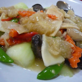 Stir fried Vegetables with sweet  pea bean, bok choy, mushroom, carrot, vegetarian abalone and fish maw