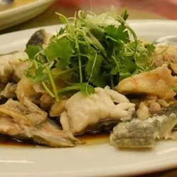Steamed Loong Tan (Giant Grouper) Fish Meat In A Superior Soy Sauce And Peanut Oil