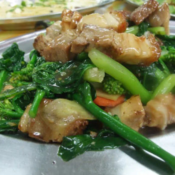 Kai Lan veggies stir fried with Siew Yok (roasted pork)