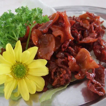 Deep Fried Pork Belly In Thin Slices Cooked With Red Tomato Sauce