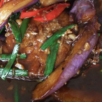 Deep fried fish with brinjal topping