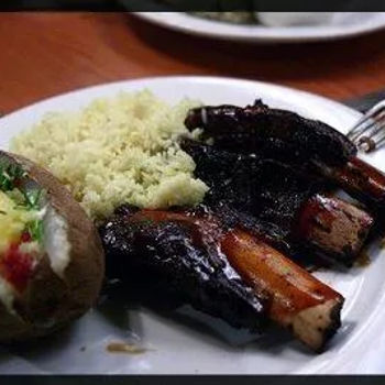 Beef ribs, rice and baked potatoes
