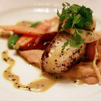 Pan Seared Chilean Cod Fish & Poached Jumbo Prawn with Chick Pea Puree, Semi Dried Tomatoes and Fresh Basil Sauce