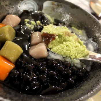Grass Jelly based flavored ice with Crystal Noodles, Taro Balls, Pearls and Grass Jelly