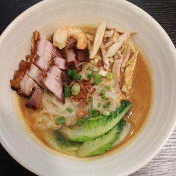 Boon Signature Chicken Hor Fun - Charcoal boiled prawn soup with Ipoh Sha Hor Fun, Chicken Floss and Crispy Siew Yuk.