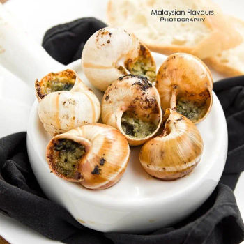 Les Escargots au Beurre