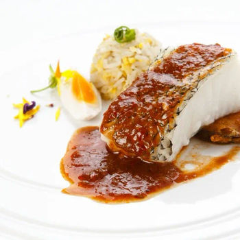 Cod Fish Assam Pedas, Served With Garlic Rice, Salted Egg And Tempura Egg Plant