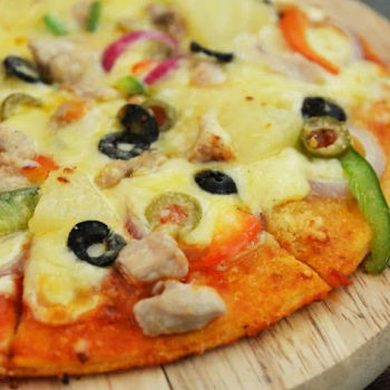 Hawaiian Pizza – Chicken, Pineapples, Capsicum, Onions and Olives.