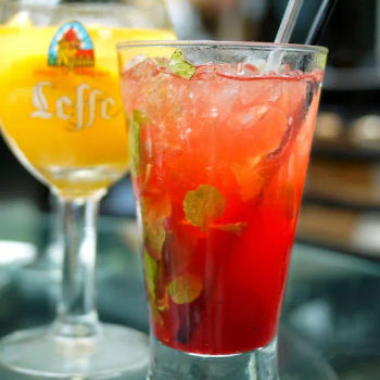 Garden Sprite (Tio Pepe, Lychee Liqueur, Strawberry Puree, Orange Wheels, Mint Leaves)