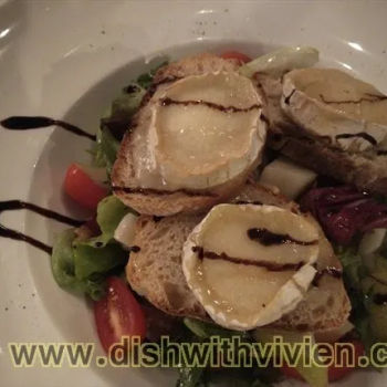 Warm Goat Cheese Salad With Honey, Pear And Walnut, Mustard Dressing