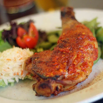 Signature Flame Broiled Mera Mera Chicken (with 2 sides)