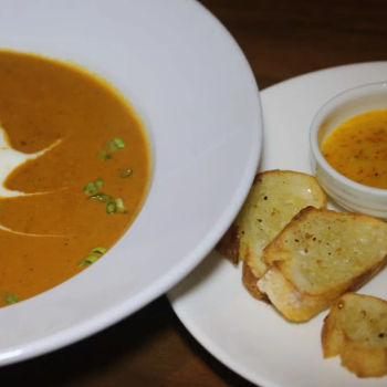 Prawn Bisque, served with sides of rouille, cheese and infused croutons