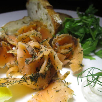 Citrus-cured Salmon Gravalax, with sides of walnut raisin sourdough