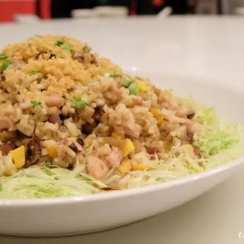 Healthy Grain Rice Which Is Fried With Golden Pumpkin And Sea Treasure Consisting Of Prawn, Dried Oyster And Dried Scallop