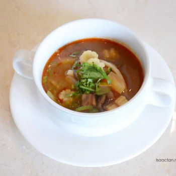 Consomme of Clear Essence of Chicken with Quenelle, Black Truffle & Angel Hair Vegetables