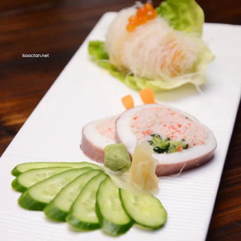 Squid stuffed with preserved cucumber (Ikakyuri) and Crispy Cod Fish layered with sweet potato