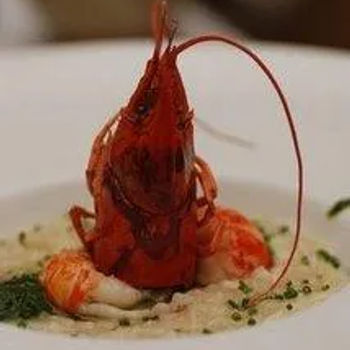 Parsley risotto with sauteed escargot