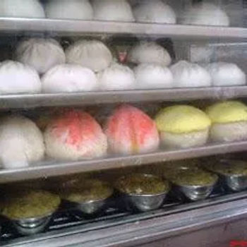 A variety of paus and 'loh mai kai'