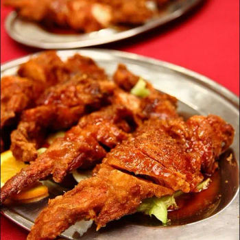 Stuffed boneless chicken wings with ham