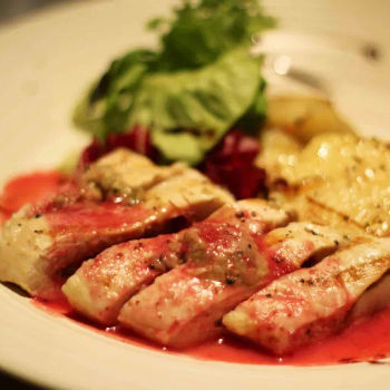 Grilled Stuffed Chicken served with Salad & Special Sauce