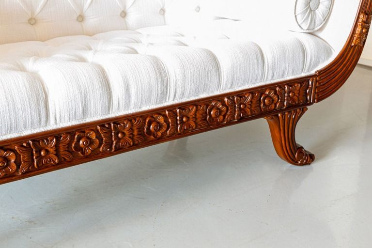 Border of Rosettes on a British colonial walnut sofa