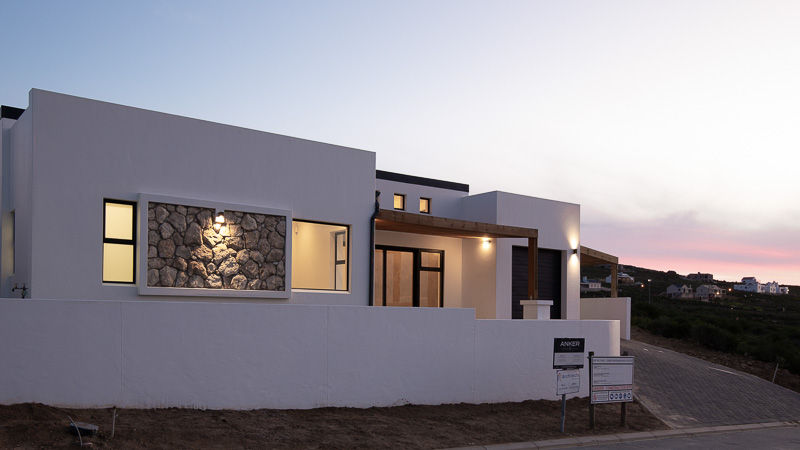Unedited twilight photo of a coastal home in St. Helena Bay before exposure correction and object removal.