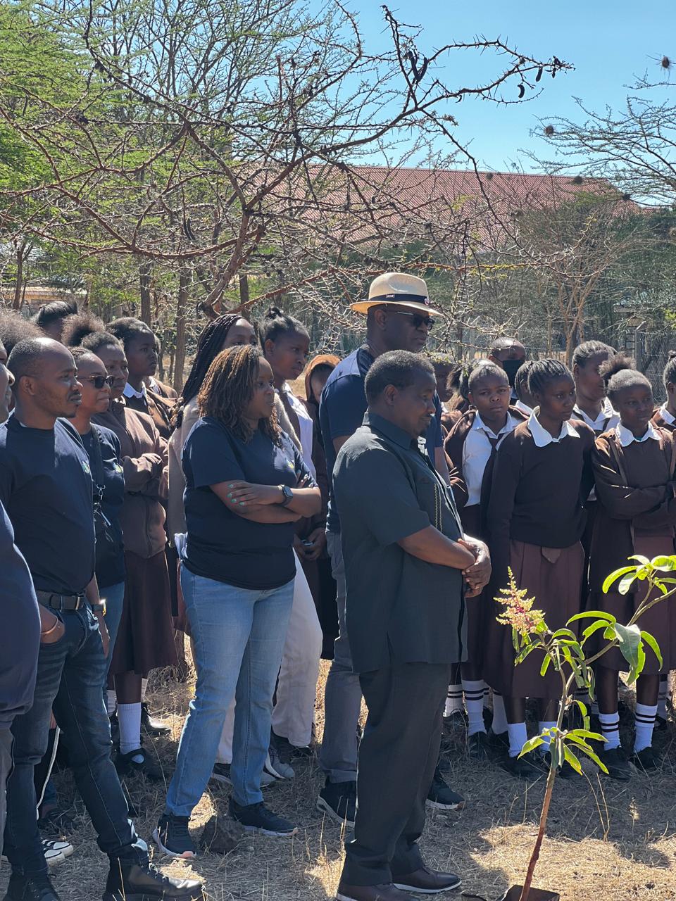 Pupils and Tree Niches volunteers planting trees during a school tree planting activity