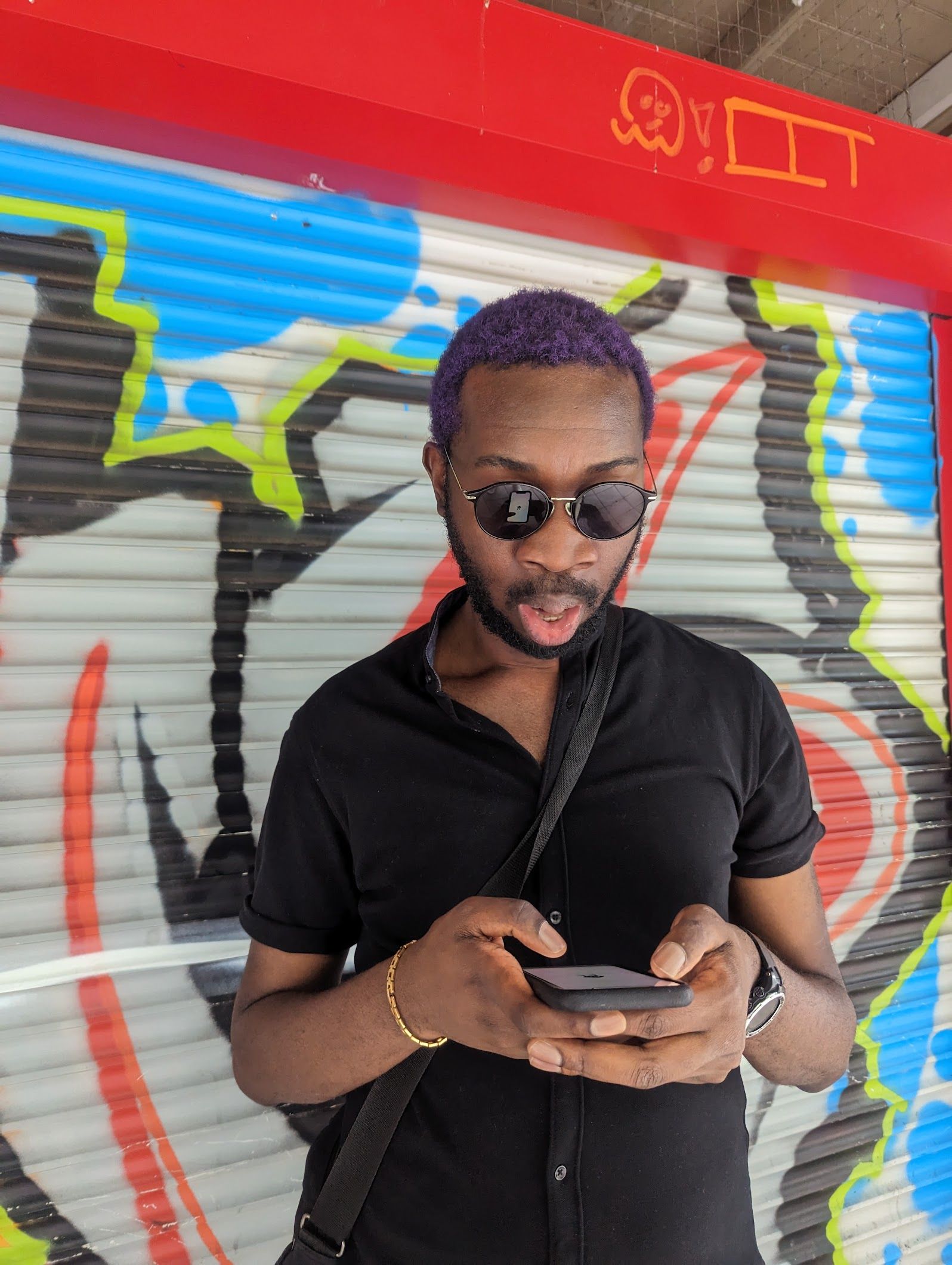 black man with purple hair