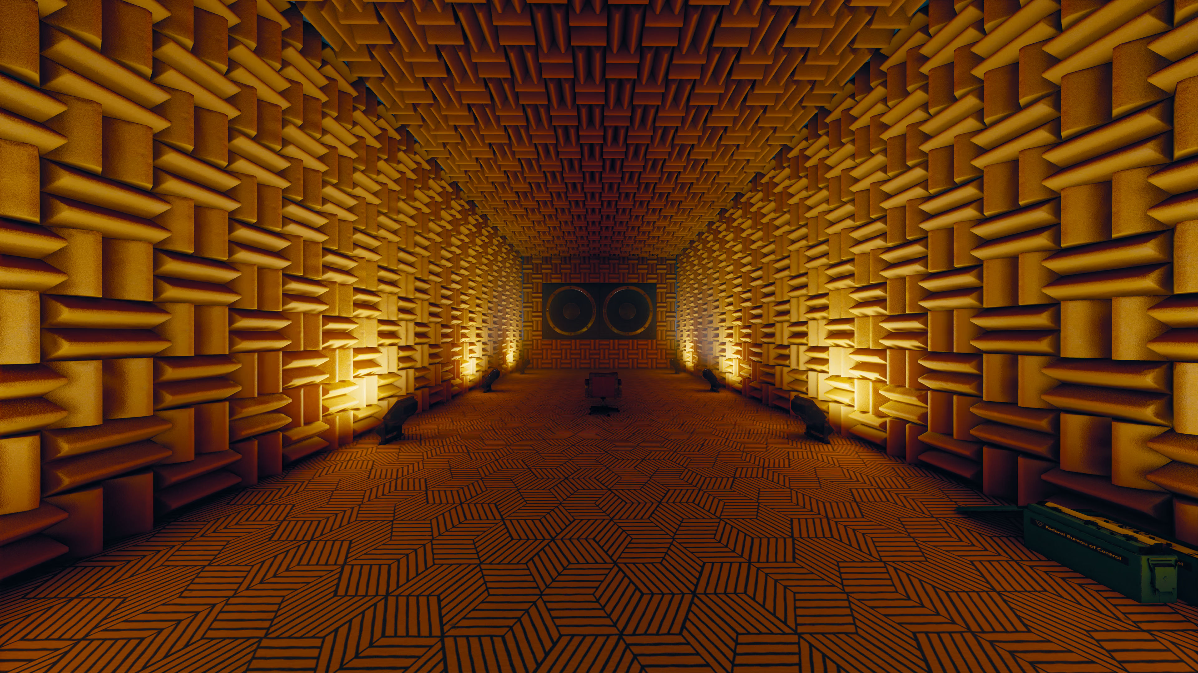 uma sala à prova de som com uma única cadeira e altifalantes embutidos na parede