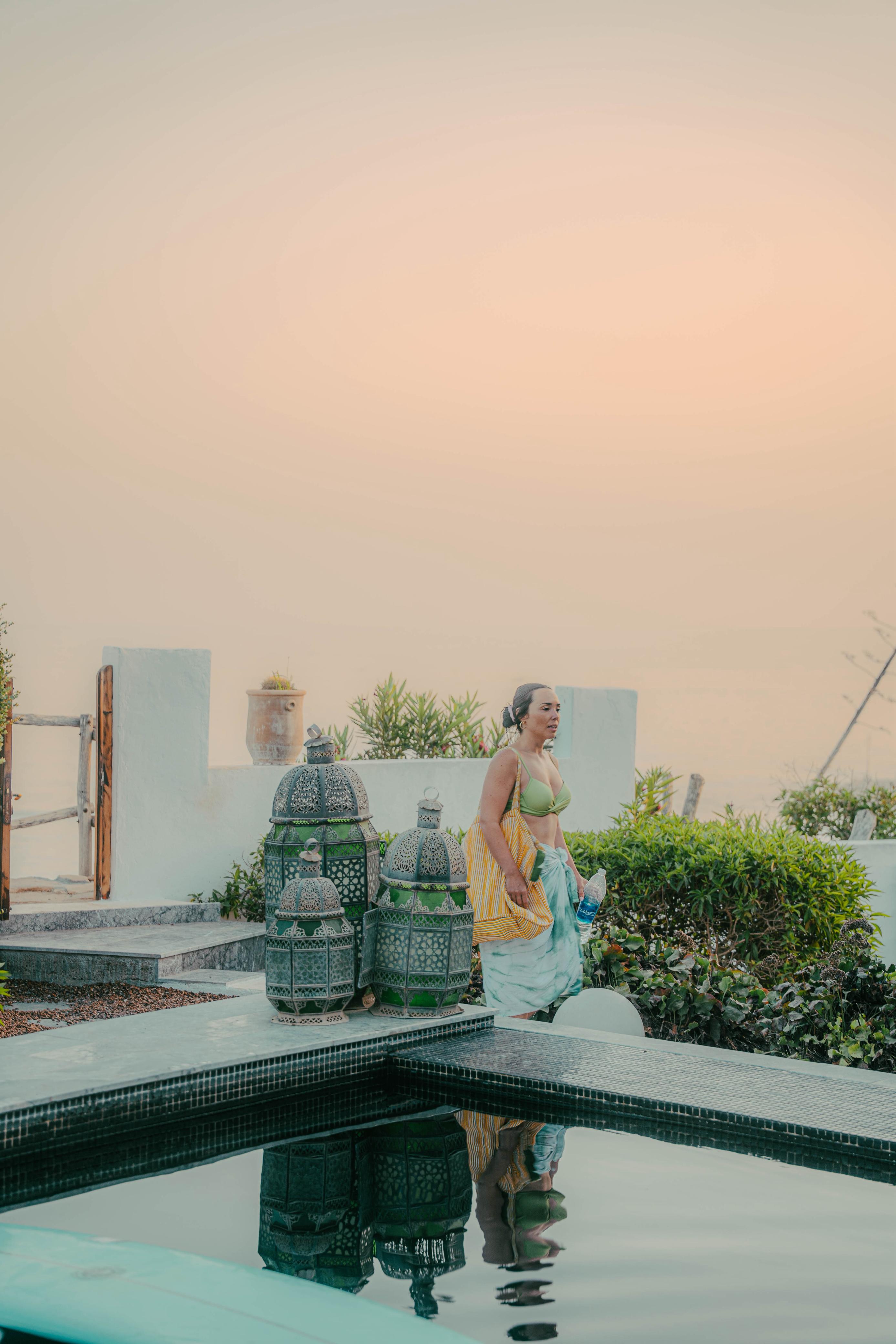 Van parked on a cliff overlooking the ocean