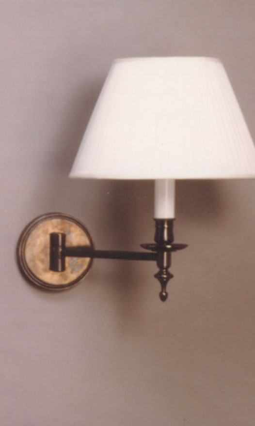 Articulated wall lamp