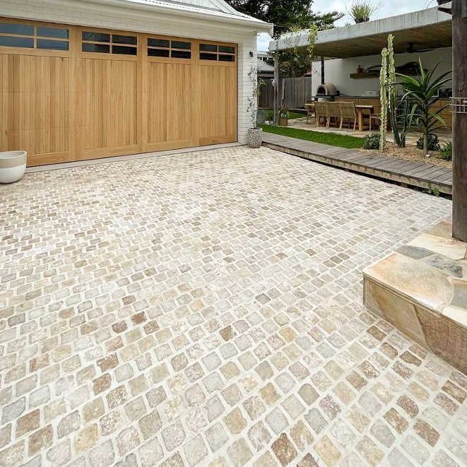 GatherCo Ironwood Project Travertine Cobblestones FabricArchitecture LuxLandscaping LoughlinFurniture