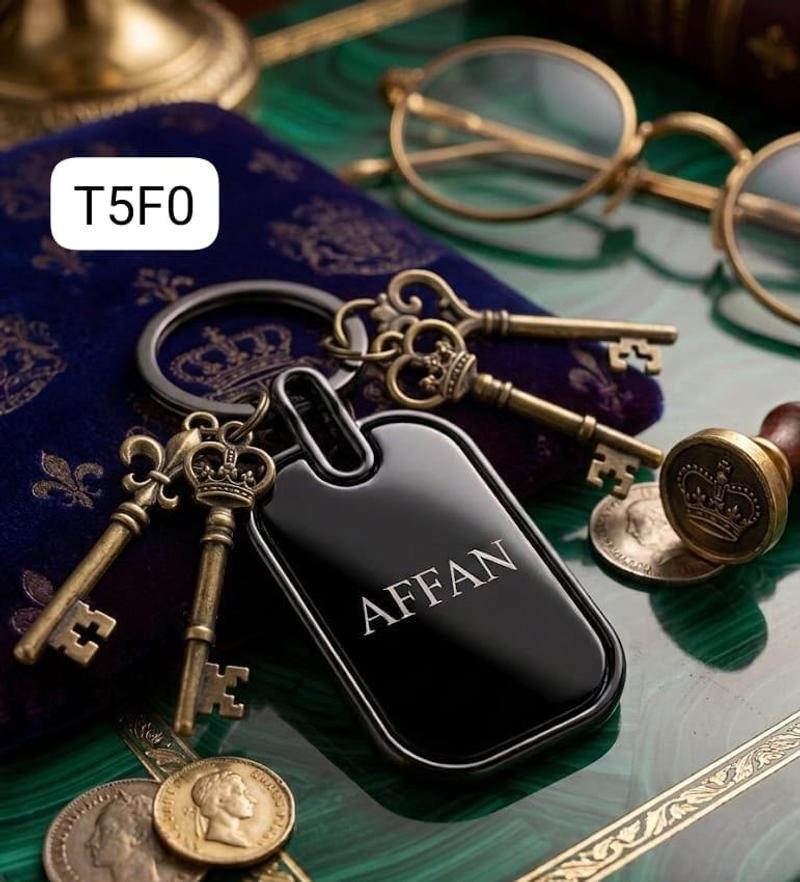 Custom engraved black metal name keychain in Pakistan