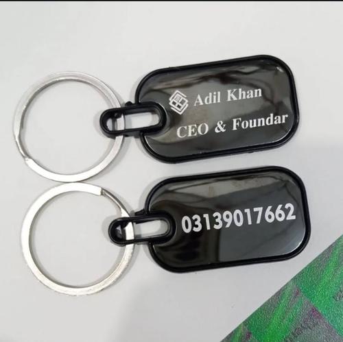 Customized metal name keychain black engraved both sides in Pakistan