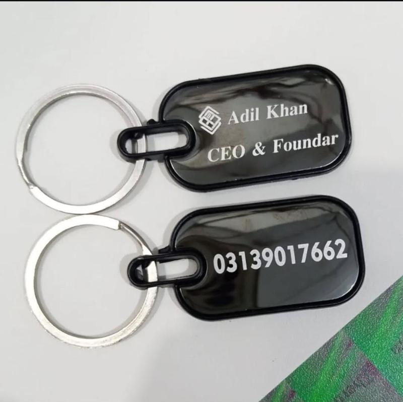 Customized metal name keychain black engraved both sides in Pakistan