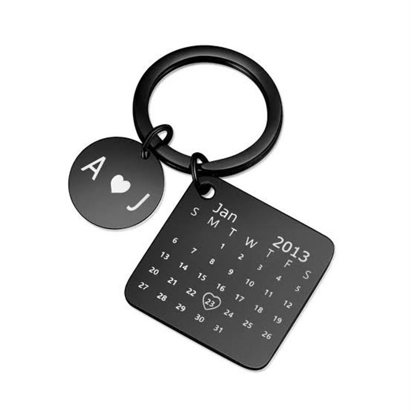 Customized calendar keychain black metal engraved special date in Pakistan