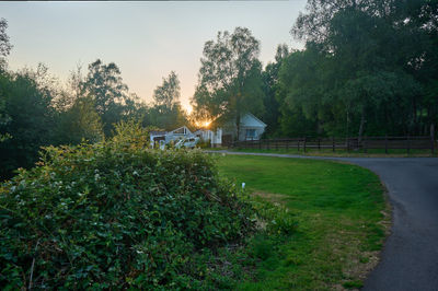 A country house at sunset. Escape to the tranquil countryside, where nature's beauty surrounds you.